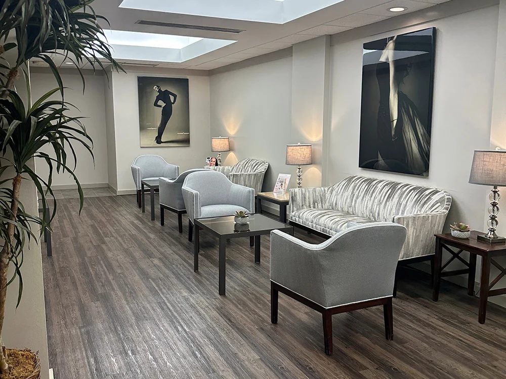 Strock Plastic Surgery Office - Waiting Room with poster display